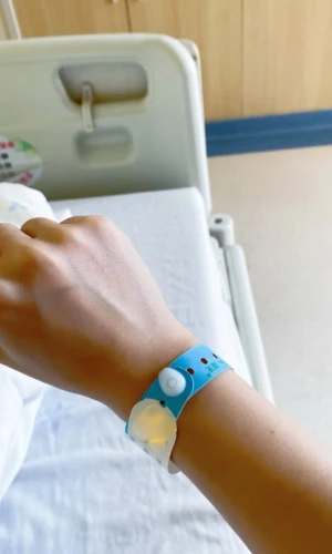 Patient wearing a wristband for display 2